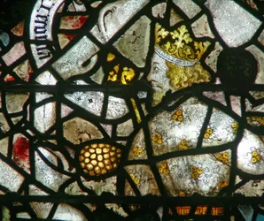 Janela w16 representando o rei Jeconiah na árvore de Jesse
