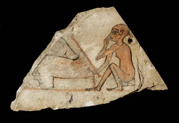 Ostracon com um rapaz e um porco ...