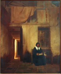 Interior com mulher de leitura e gato