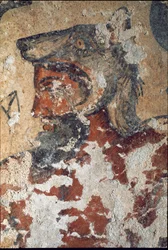 Aita (Eiza), deus etrusco da vida após a morte, com gorro de lobo, pormenor de fresco, século IV a.C.
