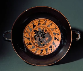 Antiquito etrusco: taça terracota representando a luta entre Heracles e o monstro marinho Tritão. De Tarquinia. 550 AC. Tarquinia, Museo Archeologico.