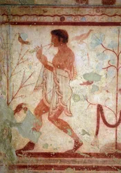 Arte etrusca: frescos que representam cenas de banquete, pormenor com um tocador de flauta. Túmulo do Triclínio. Século V a.C. Museu Arqueológico Nacional de Tarquinia, Itália