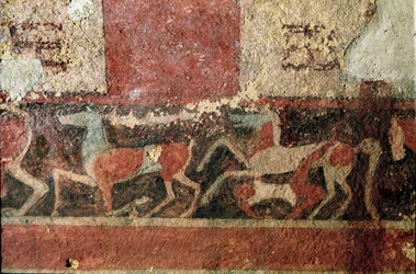Cavalos e cavaleiro. (Detalhe do fresco, 510 a.C.)