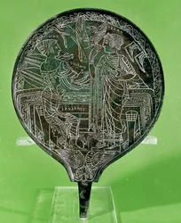 Espelho retratando Afrodite persuadindo Helen a seguir Paris para Tróia, de Palestrina (bronze)