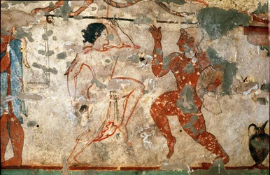 Dança ritual, jovem mulher vestindo uma túnica transparente e jovem homem nu. (Pormenor de fresco, 520 a.C.)