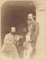 [Retrato de dois homens europeus, um sentado e outro de pé]
