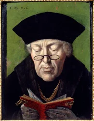 Retrato de Thomas More (1478-1535), humanista. O humanista é representado com óculos lendo um livro. Pintura da Escola Flamenga