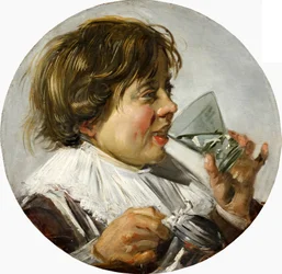 Meia retrato de um menino rindo com copo de vinho