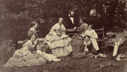 [Retrato de grupo de quatro mulheres, dois homens e três crianças em um jardim], 1850s-60s.