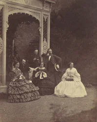 [Retrato de três mulheres e homens em um jardim], 1850s-60s.