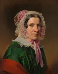Retrato de uma senhora idosa com um gorro de renda e fitas cor de rosa