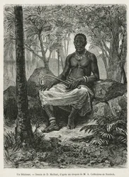 Um feticheur, feiticeiro capaz de utilizar a força mágica das fetiches, desenho de D. Maillart, para ilustrar a história de uma viagem ao Gabão e ao rio Ogoue, em 1875-1877, por Alfred Marche. Gravura em Le tour du monde