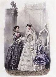 Uma mulher de vestido de noiva rodeada por uma menina e uma senhora - em "Journal des Demoiselles" 1852.