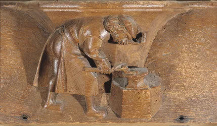Escultura representando um latoeiro, de uma banca de coro (madeira)