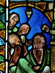 Retratando uma cena da vida de São Nicolau, ex Catedral de Troyes: o santo deixa dinheiro para um homem, impedindo assim que suas filhas entrem na prostituição