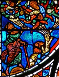Detalhe de uma janela representando a parábola do Bom Samaritano: Deus aparece a Moisés em uma sarça ardente