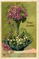 Saudações com um ramo de flores e ramos de lírio-do-vale.