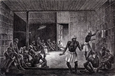 Ilustração publicada na edição de 1862 de "Le Tour du monde", retratando uma sessão de exorcismo praticado pelos Dayaks na ilha de Bornéu. Gravura.
