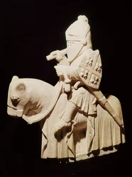 Cavaleiro de armadura no seu cavalo