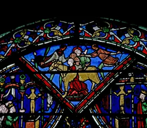 Janela w21 representando uma cena da vida de St Eustache: ele é casado com sua família no touro de bronze