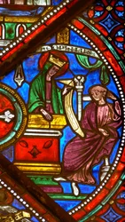 Janela w6 representando uma cena da história de Theophilus: a Virgem devolve o pacto