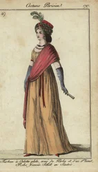 Mulher com turbante e xaile cruzado