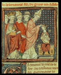 Fól. 142r: A coroação de Luís I, o Piedoso (778-840), imperador do Sacro Império Romano-Germânico, pelo papa Estêvão IV (papa 816-817) em Reims, em 816, das Grandes Chroniques de France, 1375-79