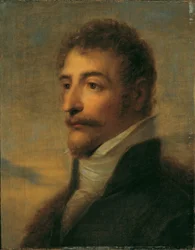 Retrato de meio comprimento de um homem barbudo