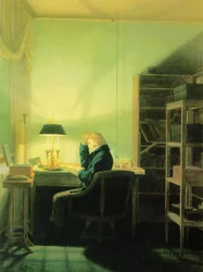 Homem a ler à luz de um candeeiro