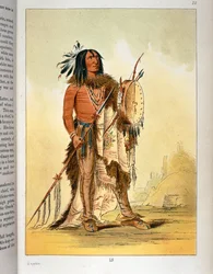 Xamã índio Blackfoot com tamborim e lança