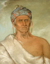 Lay-láw-she-kaw, sobe o rio, um chefe idoso