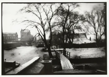 Vista de inverno sobre o Amstel em Amsterdã