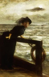 Dama de preto junto ao mar