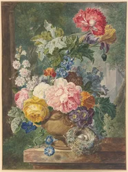 Ramo de flores numa jarra com um ninho de pássaro