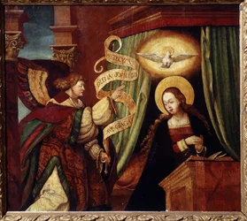 A Anunciação (The Annunciatioon). O arcanjo Gabriel traz uma mensagem em latim: "Ave gratia plena Dominus tecum" (Ave, o cheia de graça, o Senhor está convosco) (início da Ave Maria). Pintura por um mestre alemão (século XVI). Petróleo