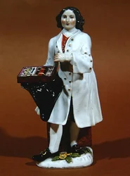 Estatueta Meissen de um vendedor de óculos (porcelana)