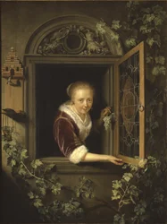 Jovem mulher na janela com um cacho de uvas, 1622