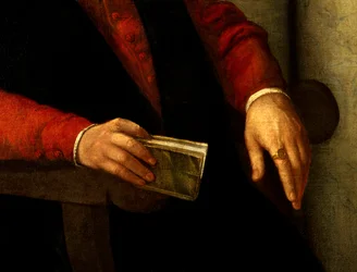 Retrato presumido de François Rabelais (1494-1553), escritor e médico francês. Detalhe do livro que ele segura na mão e do cavaleiro que carrega no dedo. Pintura de Giovanni Battista Moroni (1525-1578)