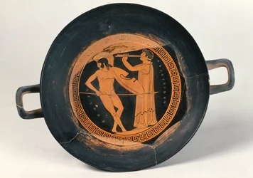 Copa grega de figuras vermelhas, representando um guerreiro dançando o Pyrrhic, por Aristeides, o Velho (cerâmica)