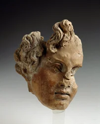 Magna Graecia (Grande Grécia): fragmento de cabeça; de Monte Antena (Roma); século V-4 a.C.; Roma, Museu de Villa Giulia - Arte da Grande Grécia: fragmento de cabeça de Monte Antena (Lazio) século V-4 a.C. Museu de Villa Giulia Roma
