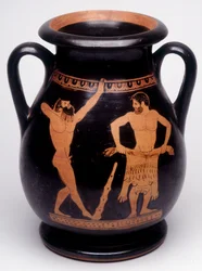 Pintura em vaso: Héracles (Hércules) prepara-se para se cobrir com a pele do leão, um atleta à sua esquerda está a aquecer. 490 a.C. BNF, Gabinete de Medalhas.
