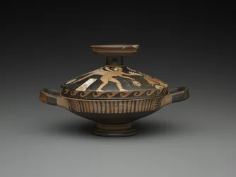 Apulian Lekanis: Chefe de uma mulher e de um génio alado (terracota)