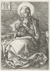 Madonna com criança no peito