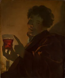 Menino com uma taça de vinho