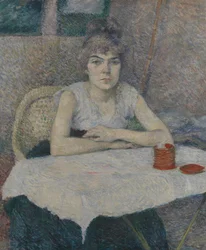 Jovem mulher em uma mesa