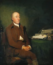 Retrato do Dr. James Hutton, comprimento de três quartos sentado em uma jaqueta marrom, calça e calções brancos, uma pilha de espécimes geológicos sobre a mesa ao lado dele,