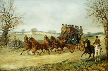 Um treinador e quatro em uma estrada de outono,