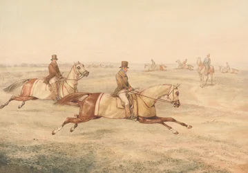 Dois cavaleiros a treinar cavalos a galope