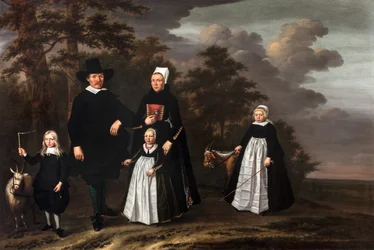 Um grupo familiar de Enkhuizen com duas cabras numa paisagem arborizada