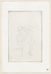 Bailarina a calçar o sapato